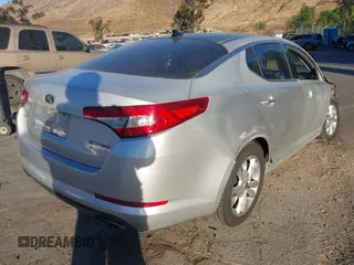 2012 Kia Optima EX with VIN 5XXGN4A67CG071208, listed as a IAAI auction lot 41302757 with 99,209 mi miles and . Bid and sale history available at carsss.com. Image 4.