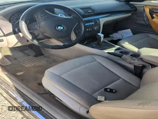 2010 BMW 1 Series 128i with VIN WBAUL7C52AVJ77448, listed as a IAAI auction lot 41886372 with 97,567 mi miles and . Bid and sale history available at DreamBid. Image 5.