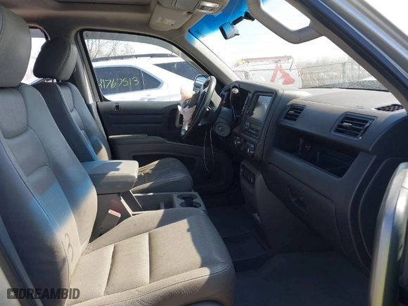 2009 Honda Ridgeline RTL with VIN 2HJYK16519H502977, listed as a IAAI auction lot 41774503 with 206,319 mi miles. Bid and sale history available at carsss.com. Image 5.
