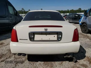 2002 Cadillac DeVille Limousine z VIN 1GEEH90Y72U550842, wystawiony jako Copart lot #52629735 z przebiegiem Nie podano mil oraz Szkoda całkowita • Salvage title. Historia ofert i sprzedaży dostępna na DreamBid. Obrazek 6.