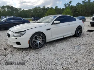 2014 BMW M6 z VIN WBSLX9C51ED160143, wystawiony jako Copart lot #73044214 z przebiegiem 91 717 mil mil oraz Szkody całkowita. Historia ofert i sprzedaży dostępna na DreamBid. Obrazek 1.