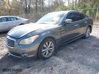 2013 Infiniti M37 with VIN JN1BY1AP0DM510398, listed as a IAAI auction lot 41621916 with 139,002 mi miles. Bid and sale history available at carsss.com. Image 2.