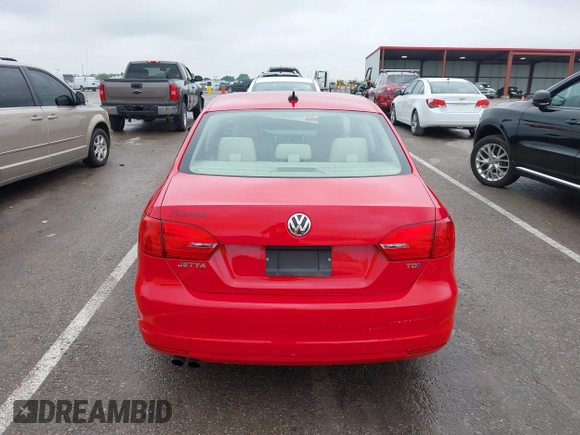 2014 Volkswagen Jetta TDI w/Premium/Nav with VIN 3VWLL7AJ4EM383351, listed as a IAAI auction lot 42424074 with 66,824 mi miles and . Bid and sale history available at DreamBid. Image 17.