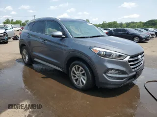 2018 Hyundai Tucson SEL with VIN KM8J3CA42JU729265, listed as a Copart auction lot 60167665 with 174,318 mi miles and Salvage title. Bid and sale history available at DreamBid. Image 4.