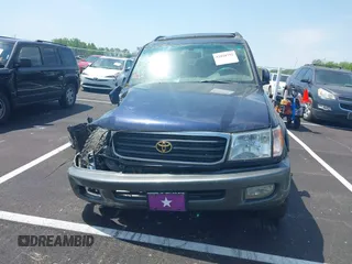 2000 Toyota Land Cruiser with VIN JT3HT05J8Y0123024, listed as a IAAI auction lot 42028792 with 360,074 mi miles. Bid and sale history available at carsss.com. Image 12.