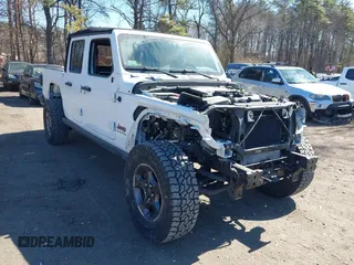 2020 Jeep Gladiator Rubicon with VIN 1C6JJTBG1LL181875, listed as a IAAI auction lot 41722037 with 51,037 mi miles and . Bid and sale history available at DreamBid. Image 1.