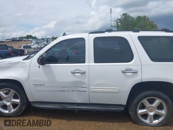 2013 Chevrolet Tahoe LS with VIN 1GNSCAE01DR260799, listed as a IAAI auction lot 42496680 with 199,276 mi miles and . Bid and sale history available at DreamBid. Image 15.