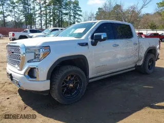 2020 GMC Sierra 1500 Denali with VIN 1GTU9FEL7LZ152659, listed as a IAAI auction lot 41662492 with 101,222 mi miles. Bid and sale history available at carsss.com. Image 2.