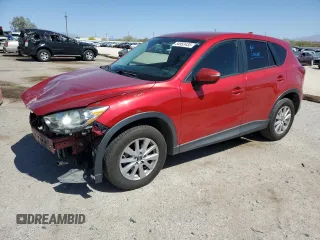 2016 Mazda CX-5 Touring z VIN JM3KE2CY8G0789197, wystawiony jako Copart lot #54953435 z przebiegiem 122 738 mil mil oraz Szkoda całkowita • Salvage title. Historia ofert i sprzedaży dostępna na DreamBid. Obrazek 1.