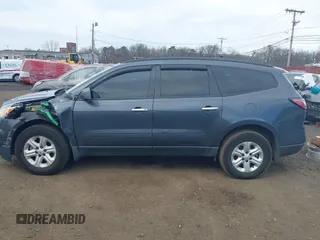 2014 Chevrolet Traverse LS z VIN 1GNKVFKD3EJ187997, wystawiony jako IAAI lot #41834781 z przebiegiem 150 994 mil mil oraz . Historia ofert i sprzedaży dostępna na DreamBid. Obrazek 14.