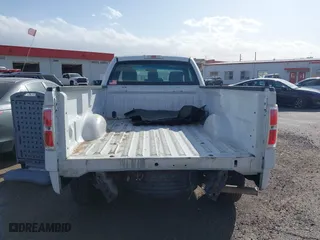 2014 Ford F-150 XL with VIN 1FTMF1CM4EKE98669, listed as a IAAI auction lot 41310314 with 133,239 mi miles. Bid and sale history available at carsss.com. Image 16.