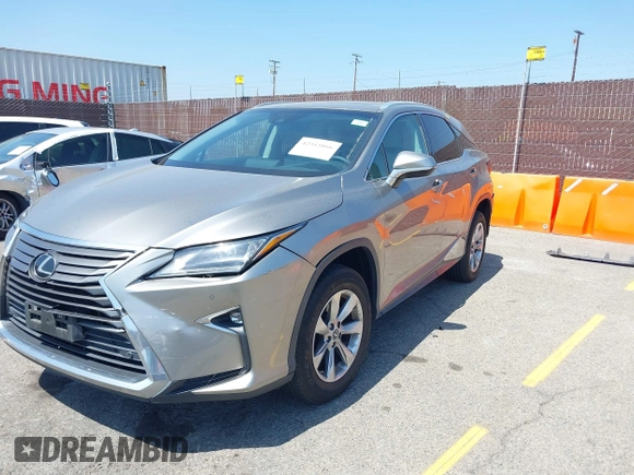 2018 Lexus RX 350 with VIN 2T2ZZMCA4JC115390, listed as a IAAI auction lot 42515866 with 51,760 mi miles and . Bid and sale history available at DreamBid. Image 2.