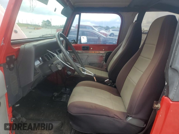 1995 Jeep Wrangler S with VIN 1J4FY19P4SP318216, listed as a Copart auction lot 52751605 with 241,154 mi miles and Salvage title. Bid and sale history available at DreamBid. Image 7.