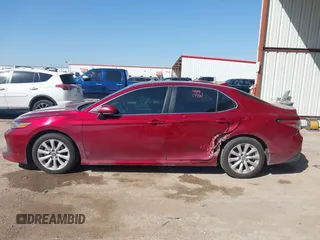 2019 Toyota Camry LE with VIN 4T1B11HK4KU725075, listed as a IAAI auction lot 41781275 with 156,856 mi miles and . Bid and sale history available at DreamBid. Image 14.