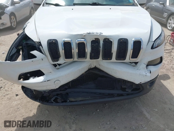 2015 Jeep Cherokee Latitude z VIN 1C4PJMCS3FW557734, wystawiony jako IAAI lot #42273937 z przebiegiem 168 828 mil mil oraz . Historia ofert i sprzedaży dostępna na DreamBid. Obrazek 6.