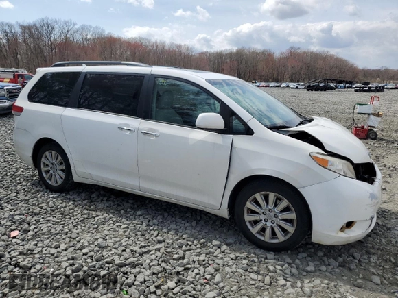 2011 Toyota Sienna XLE with VIN 5TDDK3DC1BS010411, listed as a Copart auction lot 51213065 with 174,214 mi miles and Salvage title. Bid and sale history available at DreamBid. Image 4.