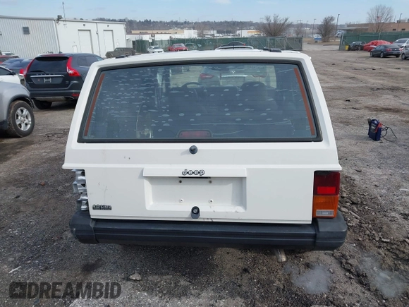 1996 Jeep Cherokee Sport with VIN 1J4FJ68S6TL234012, listed as a IAAI auction lot 41571658 with 255,817 mi miles. Bid and sale history available at carsss.com. Image 17.