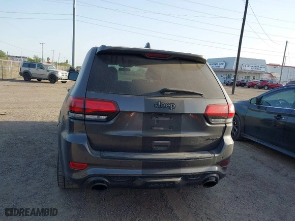 2015 Jeep Grand Cherokee SRT with VIN 1C4RJFDJ9FC842448, listed as a IAAI auction lot 41850385 with 178,439 mi miles. Bid and sale history available at carsss.com. Image 16.