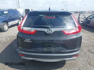 2018 Honda CR-V EX with VIN 7FARW1H59JE001943, listed as a IAAI auction lot 42123180 with 72,451 mi miles and . Bid and sale history available at carsss.com. Image 17.