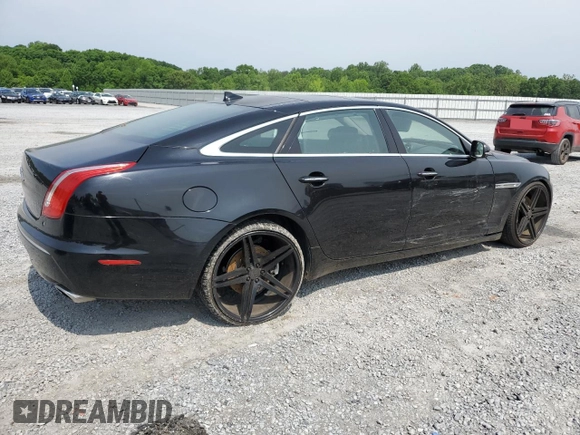 2014 Jaguar XJ with VIN SAJWA2GZ7E8V60213, listed as a Copart auction lot 53382454 with 88,870 mi miles and Salvage Title. Bid and sale history available at carsss.com. Image 3.