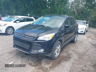2013 Ford Escape SE with VIN 1FMCU9G95DUC56302, listed as a IAAI auction lot 42553915 with 151,390 mi miles and . Bid and sale history available at DreamBid. Image 2.