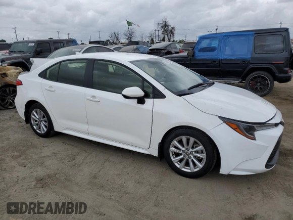 2024 Toyota Corolla LE with VIN JTDB4MEEXR3016274, listed as a Copart auction lot 51853975 with 15,953 mi miles and Salvage Title. Bid and sale history available at carsss.com. Image 4.