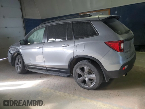2021 Honda Passport Touring with VIN 5FNYF8H93MB010192, listed as a Copart auction lot 83013954 with Not Provided miles and Salvage Title. Bid and sale history available at carsss.com. Image 2.