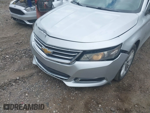 2014 Chevrolet Impala LT with VIN 1G1125S34EU123487, listed as a IAAI auction lot 42088001 with 184,553 mi miles and . Bid and sale history available at DreamBid. Image 6.