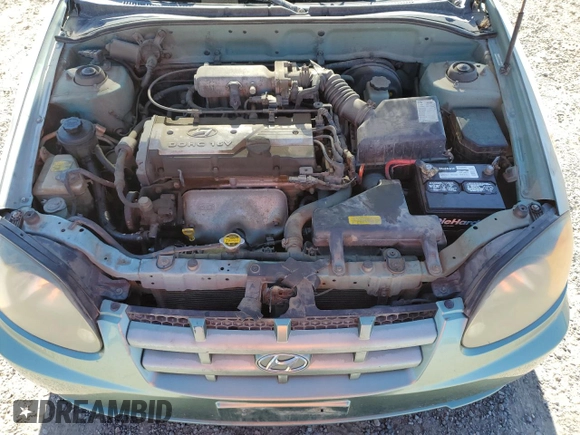 2003 Hyundai Accent GL with VIN KMHCG35C83U257641, listed as a Copart auction lot 73421464 with 143,814 mi miles and Clean Title. Bid and sale history available at carsss.com. Image 11.