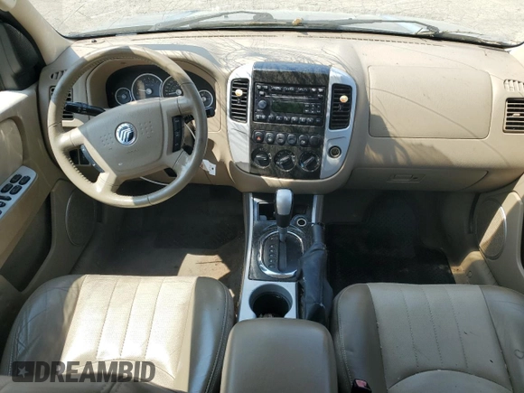 2005 Mercury Mariner Luxury z VIN 4M2YU57155DJ28005, wystawiony jako Copart lot #63460344 z przebiegiem 131 531 mil mil oraz Szkody całkowita. Historia ofert i sprzedaży dostępna na DreamBid. Obrazek 8.