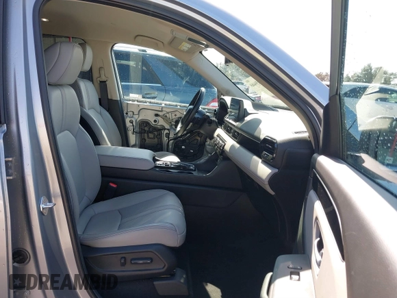 2023 Honda Pilot EX-L 8 Passenger with VIN 5FNYG2H42PB001292, listed as a IAAI auction lot 41594469 with 21,470 mi miles. Bid and sale history available at carsss.com. Image 5.