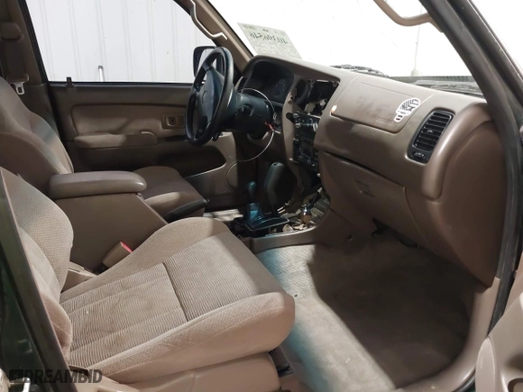 1999 Toyota 4Runner SR5 with VIN JT3HN86R6X0210142, listed as a IAAI auction lot 40396546 with 257,396 mi miles. Bid and sale history available at carsss.com. Image 5.