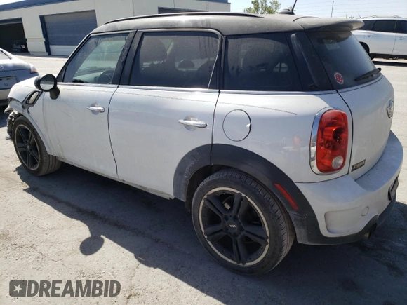 2013 MINI Countryman S with VIN WMWZC3C5XDWP22342, listed as a Copart auction lot 49702823 with 104,441 mi miles and Non repairable. Bid and sale history available at DreamBid. Image 2.