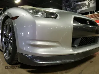 2009 Nissan GT-R Premium с VIN JN1AR54F89M252013, выставлен на аукционе Copart как лот 70656764 с пробегом 66 085 миль миль и Списание • Salvage title. История ставок и продаж доступна на DreamBid. Изображение 14.