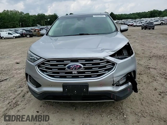 2020 Ford Edge Titanium с VIN 2FMPK4K94LBB35427, выставлен на аукционе Copart как лот 59682805 с пробегом 102 994 миль миль и Списание • Salvage title. История ставок и продаж доступна на DreamBid. Изображение 13.