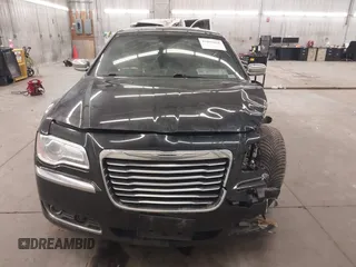 2013 Chrysler 300 with VIN 2C3CCAKT1DH667134, listed as a IAAI auction lot 41891856 with 162,489 mi miles. Bid and sale history available at carsss.com. Image 13.