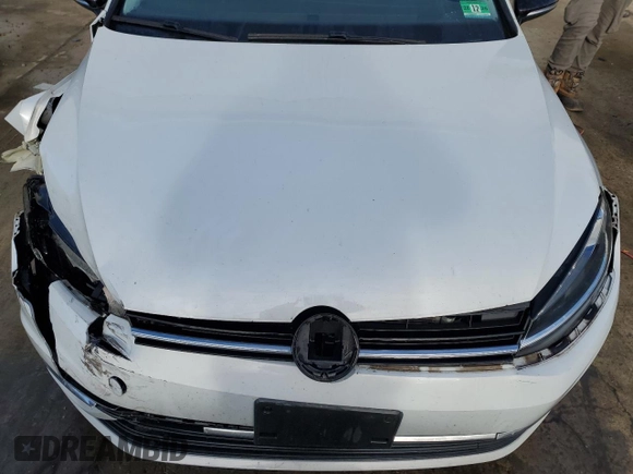 2018 Volkswagen Golf S z VIN 3VW117AUXJM760394, wystawiony jako Copart lot #82150494 z przebiegiem 113 381 mil mil oraz Szkoda całkowita • Salvage title. Historia ofert i sprzedaży dostępna na DreamBid. Obrazek 11.