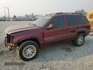 2002 Jeep Grand Cherokee Limited with VIN 1J4GX58S82C230247, listed as a Copart auction lot 73573554 with 160,357 mi miles and Salvage Title. Bid and sale history available at DreamBid. Image 1.