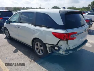 2018 Honda Odyssey EX with VIN 5FNRL6H57JB100035, listed as a IAAI auction lot 42582758 with 88,585 mi miles and . Bid and sale history available at DreamBid. Image 3.