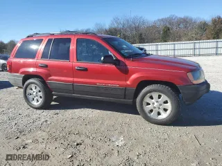 2001 Jeep Grand Cherokee Laredo with VIN 1J4GW48N41C701347, listed as a Copart auction lot 78946764 with 180,232 mi miles and Salvage Title. Bid and sale history available at carsss.com. Image 4.