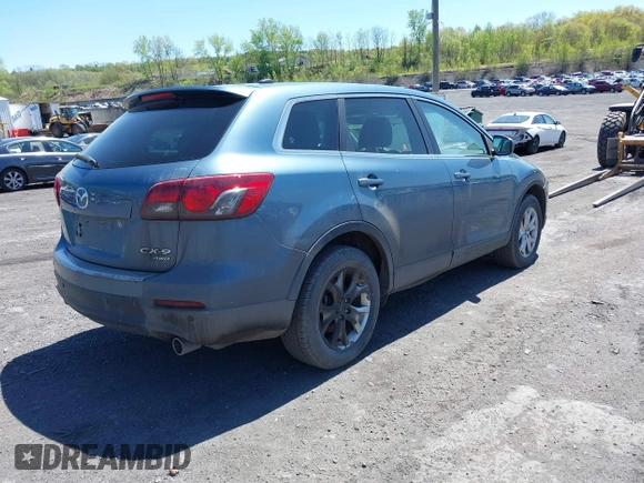2014 Mazda CX-9 Touring with VIN JM3TB3CV1E0447130, listed as a IAAI auction lot 40815387 with 148,985 mi miles. Bid and sale history available at carsss.com. Image 4.