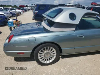 2004 Ford Thunderbird Pacific Coast Roadster with VIN 1FAHP63A04Y108766, listed as a Copart auction lot 74766964 with 30,107 mi miles and Salvage Title. Bid and sale history available at DreamBid. Image 10.