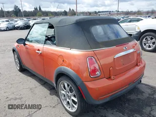 2005 MINI Convertible z VIN WMWRF33485TF60893, wystawiony jako IAAI lot #41831159 z przebiegiem 92 184 mil mil oraz . Historia ofert i sprzedaży dostępna na DreamBid. Obrazek 3.