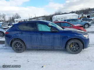 2021 Alfa Romeo Stelvio Ti with VIN ZASPAKBN1M7D09433, listed as a IAAI auction lot 41378468 with 31,717 mi miles. Bid and sale history available at carsss.com. Image 13.