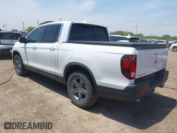 2023 Honda Ridgeline RTL z VIN 5FPYK3F51PB028295, wystawiony jako IAAI lot #42031783 z przebiegiem 39 228 mil mil oraz . Historia ofert i sprzedaży dostępna na DreamBid. Obrazek 3.