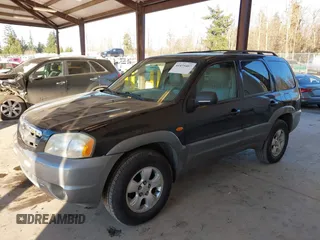 2002 Mazda Tribute LX with VIN 4F2CU08172KM58561, listed as a IAAI auction lot 41435407 with 141,908 mi miles and . Bid and sale history available at carsss.com. Image 17.
