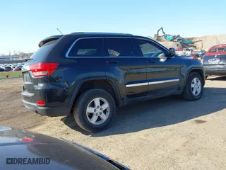 2012 Jeep Grand Cherokee Laredo with VIN 1C4RJFAG5CC118826, listed as a IAAI auction lot 42039801 with 158,153 mi miles. Bid and sale history available at carsss.com. Image 4.