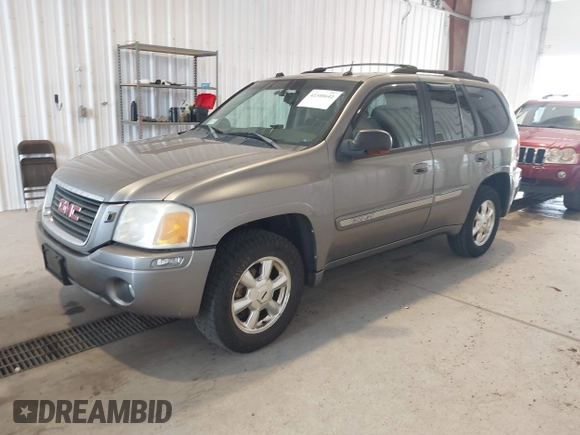 2005 GMC Envoy SLE z VIN 1GKDT13S252285747, wystawiony jako IAAI lot #42340642 z przebiegiem Nie podano mil oraz . Historia ofert i sprzedaży dostępna na DreamBid. Obrazek 2.