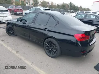 2018 BMW 3 Series 320i with VIN WBA8E1G54JNU93257, listed as a IAAI auction lot 41719141 with 144,381 mi miles. Bid and sale history available at carsss.com. Image 3.