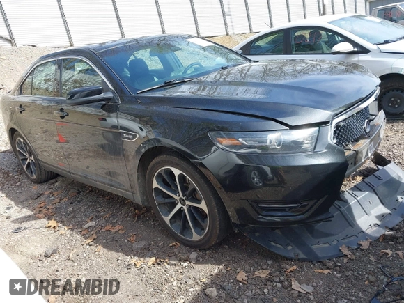 2014 Ford Taurus SHO with VIN 1FAHP2KT8EG131067, listed as a IAAI auction lot 42102086 with 107,822 mi miles. Bid and sale history available at carsss.com. Image 1.